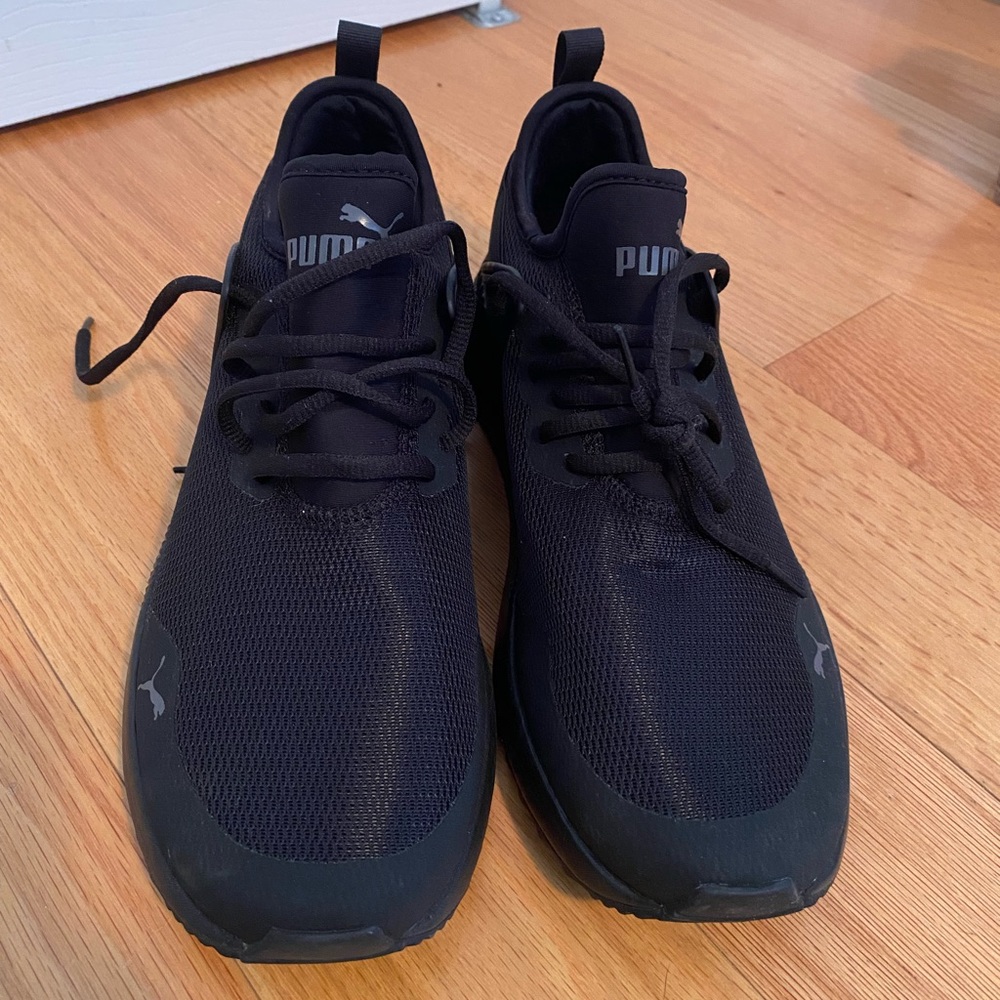 Black pumas. Never been worn. Size 9.5